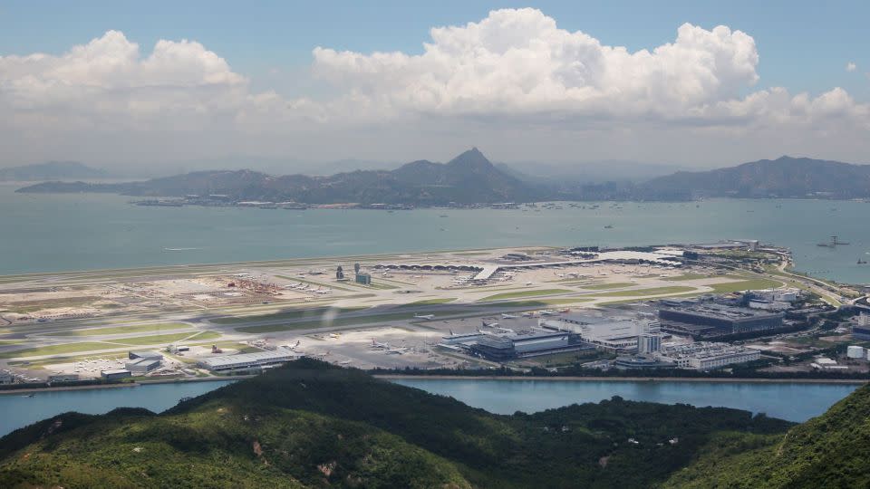 Fly into Hong Kong for incredible views of the South China Sea. - Nora Tam/South China Morning Post/Getty Images