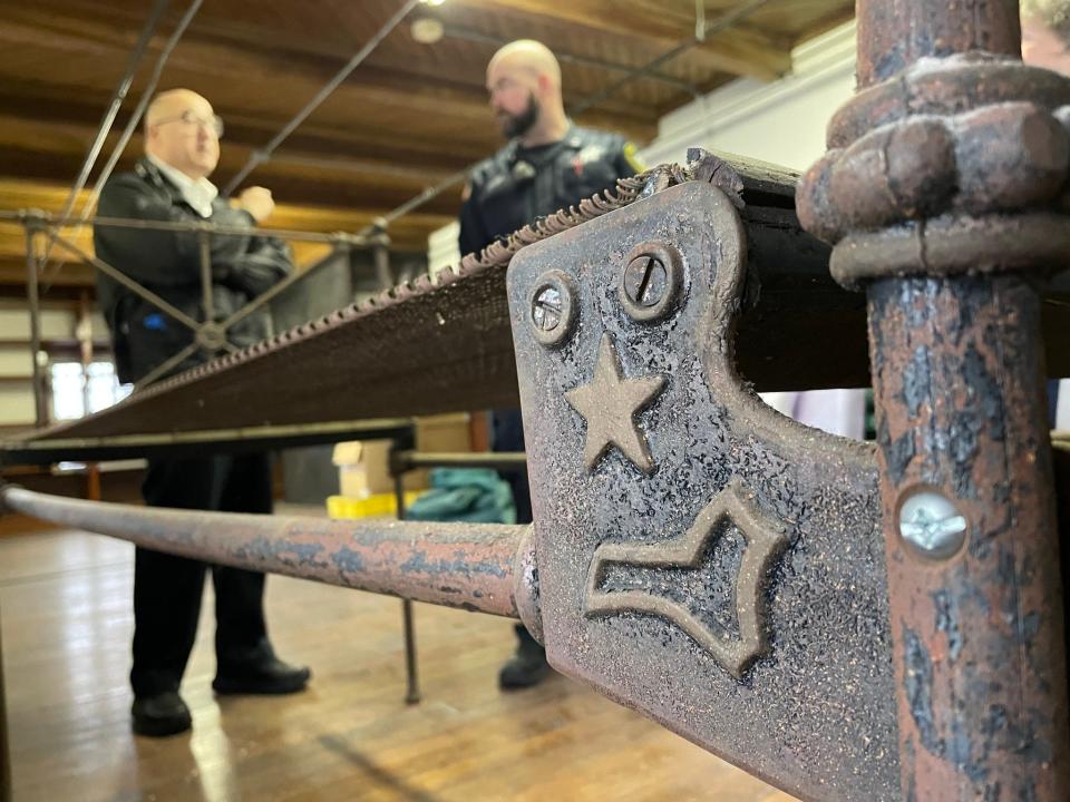 Markings on a historic bed that may have been the one Lizzie Borden slept on while she was imprisoned. Members of the Fall River Historical Society went to New Bedford's Ash Street Jail to examine it on Thursday.