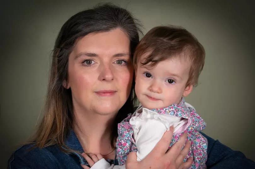 Rebecca and baby Harper, who was born just hours after her father was found dead -Credit:Andy Stenning/Daily Mirror