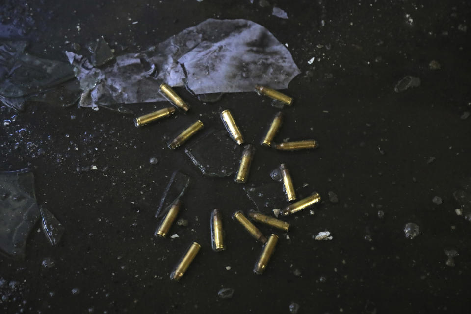 Bullet-shells are seen in a room at the Kabul University after a deadly attack in Kabul, Afghanistan, Tuesday, Nov. 3, 2020. The brazen attack by gunmen who stormed the university has left many dead and wounded in the Afghan capital. The assault sparked an hours-long gun battle. (AP Photo/Rahmat Gul)