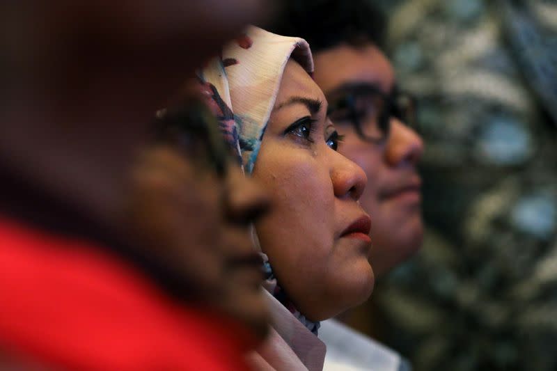 Victim's family member sheds a tear during the sixth annual remembrance event for the missing Malaysia Airlines flight MH370 in Putrajaya