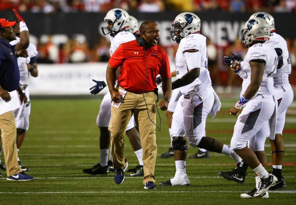 Howard coach Mike London shouts to his team during a victory over UNLV at Sam Boyd Stadium in Las Vegas on Saturday, Sept. 2, 2017. (Chase Stevens/Las Vegas Review-Journal via AP)
