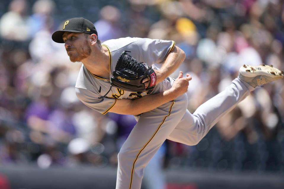 Pittsburgh Pirates starting pitcher Chad Kuhl works against the Colorado Rockies in the second inning of a baseball game Wednesday, June 30, 2021, in Denver. (AP Photo/David Zalubowski)