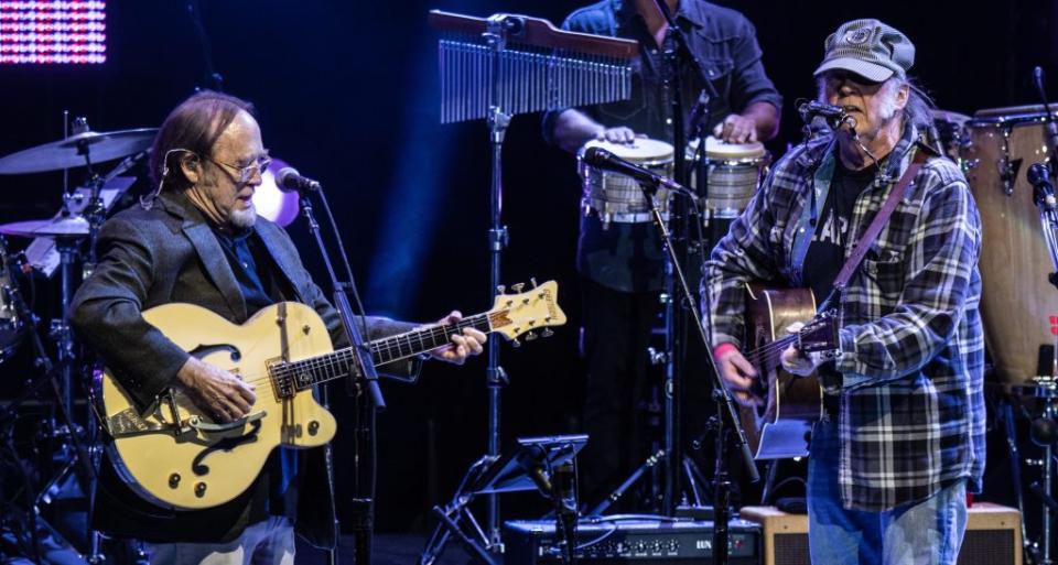 LOS ANGELES, CALIFORNIA - APRIL 22: (L-R) Stephen Stills & Neil Young perform at the Autism Speaks Light Up The Blues 6 Concert at The Greek Theatre on April 22, 2023 in Los Angeles, California. (Photo by Harmony Gerber/Getty Images)