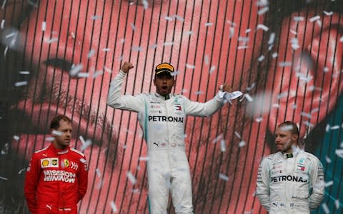 Vettel finished second, while Bottas was third - Credit: AP