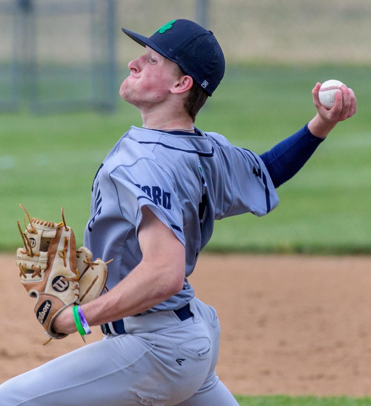 Peoria Notre Dame pitcher Alex Osmulski throws to a Washington batter during their Class 3A Metamora Regional baseball game Wednesday, May 25, 2022 at Metamora High School. The Panthers defeated the Irish 14-0.