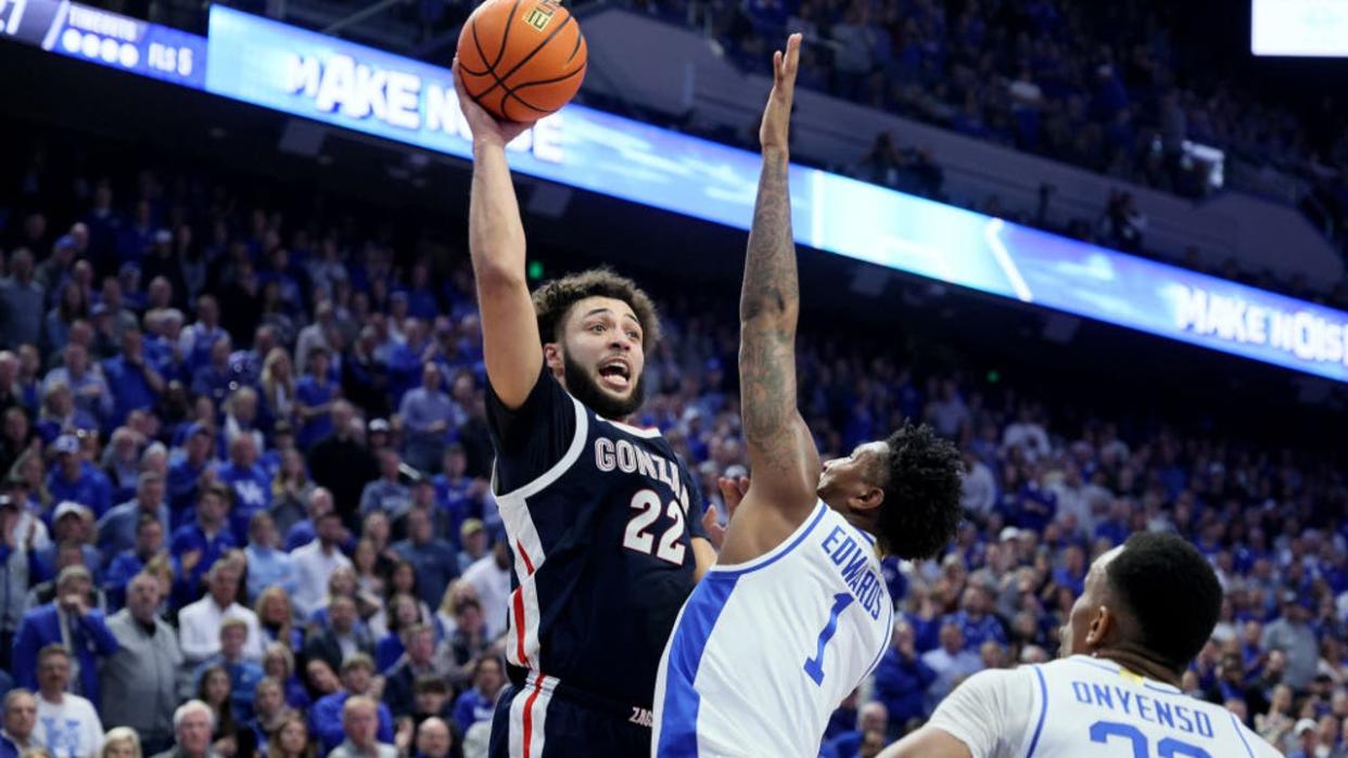 <div>LEXINGTON, KENTUCKY - FEBRUARY 10: Anton Watson #22 of the Gonzaga Bulldogs shoots the ball while defended by Justin Edwards #1of the Kentucky Wildcats at Rupp Arena on February 10, 2024 in Lexington, Kentucky.</div> <strong>((Photo by Andy Lyons/Getty Images))</strong>