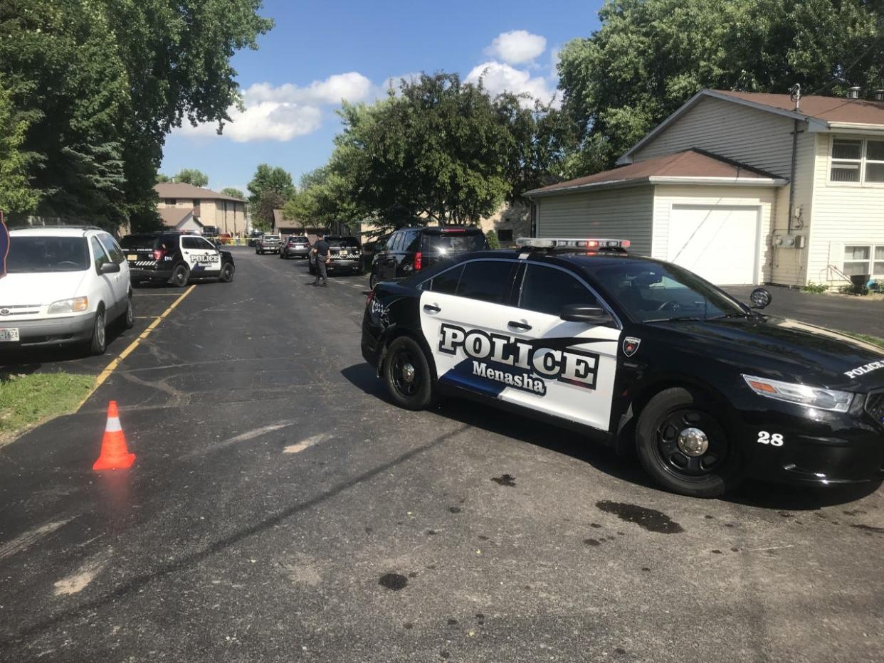 Menasha police respond to a 2019 fatal shooting that occurred while officers were executing a search warrant at an apartment in the 900 block of Tayco Street.