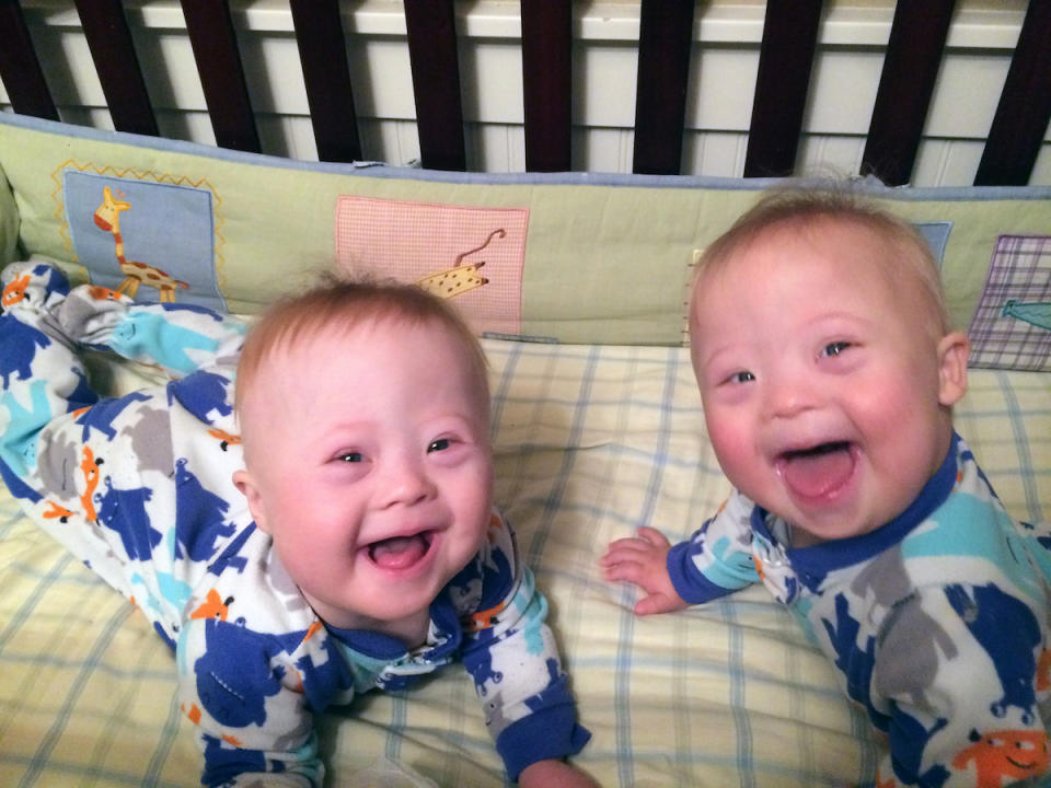 Pic from Caters News - (Pictured: left to right Charlie and Milo smile for the camera) Meet the Goofball Brothers the incredibly rare Down syndrome TWINS who are guaranteed to make you smile. Mum Julie McConnel, 45, from Nampa, Idaho, USA, already had four children when she fell pregnant for a fifth time last August. She and her husband Dan, 46, had hoped to give their three-year-old son Andy a little sister, but instead fell pregnant with twin boys, Charlie and Milo. Because of Julies age, she knew that the likelihood of having multiples or a child with Down syndrome would be greater, but she never expected both to happen. She admits she was distraught when she learned the news Charlie and Milo had the condition and even considered putting them up for adoption, fearing that she and her husband didnt have the capacity to care for two children with special needs. Now Julies sharing her story to show others that having a child with special needs isnt as scary as they may think and her Goofball Brothers - named after a sketch in the film The Wedding Singer - are proof of that. SEE CATERS COPY