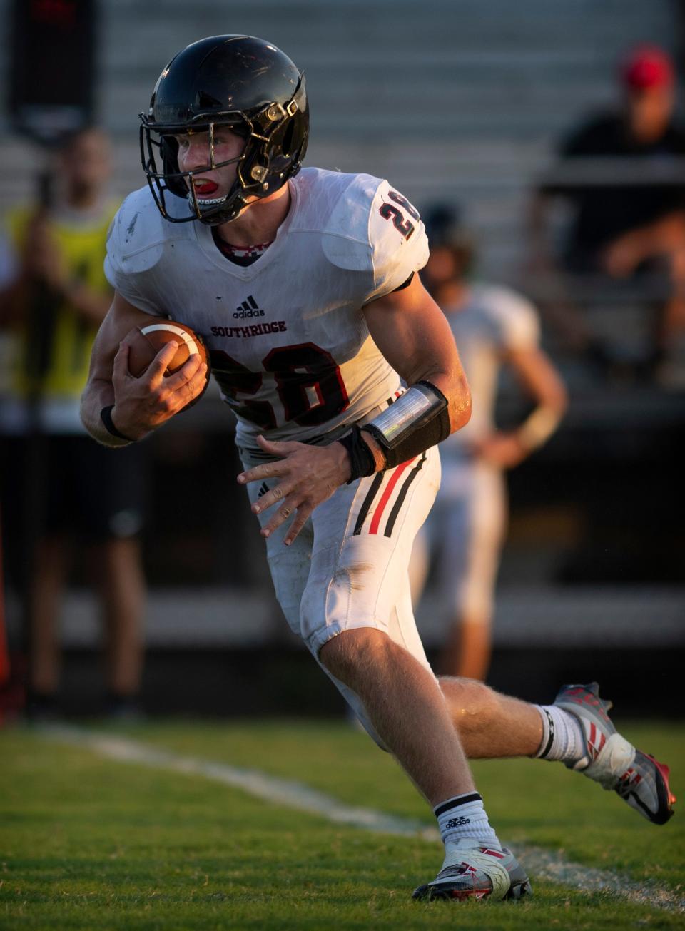 Southridge's Reid Schroeder (28) runs against Boonville during their game at Bennett Field in Boonville, Ind., Friday night, Aug. 26, 2022. Southridge beat Boonville in a hot and humid dogfight 13-0.