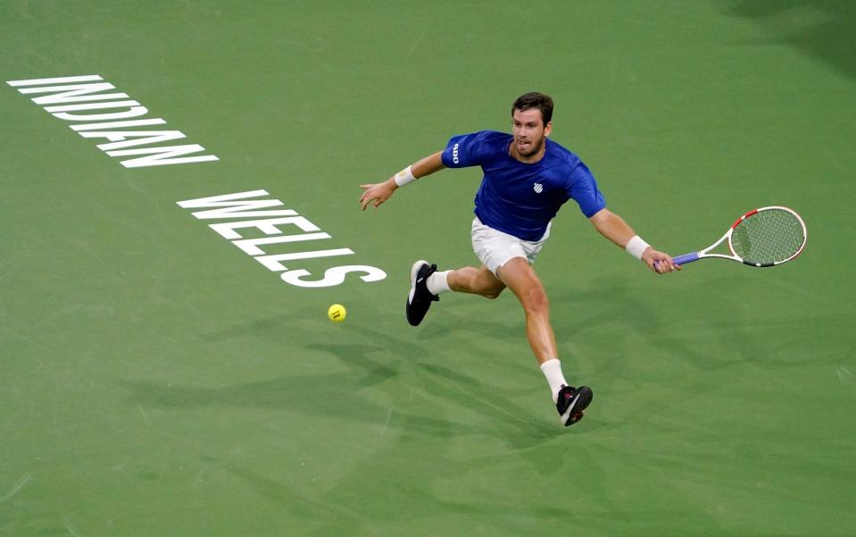  Cameron Norrie, of Britain, returns to Nikoloz Basilashvili, of Georgia, in the singles final at the BNP Paribas Open tennis tournament Sunday, Oct. 17, 2021, in Indian Wells, Calif - AP Photo/Mark J. Terrill