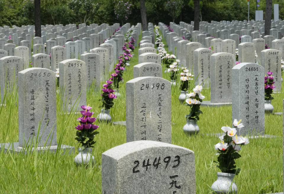 Gravestones for South Korean soldiers who died during the Korean War line up at the National Cemetery in Seoul, South Korea, Tuesday, July 25, 2023. The truce that stopped the bloodshed in the Korean War turns 70 years old on Thursday, July 27, 2023 and the two Koreas are marking the anniversary in starkly different ways, underscoring their deepening nuclear tensions. (AP Photo/Ahn Young-joon)