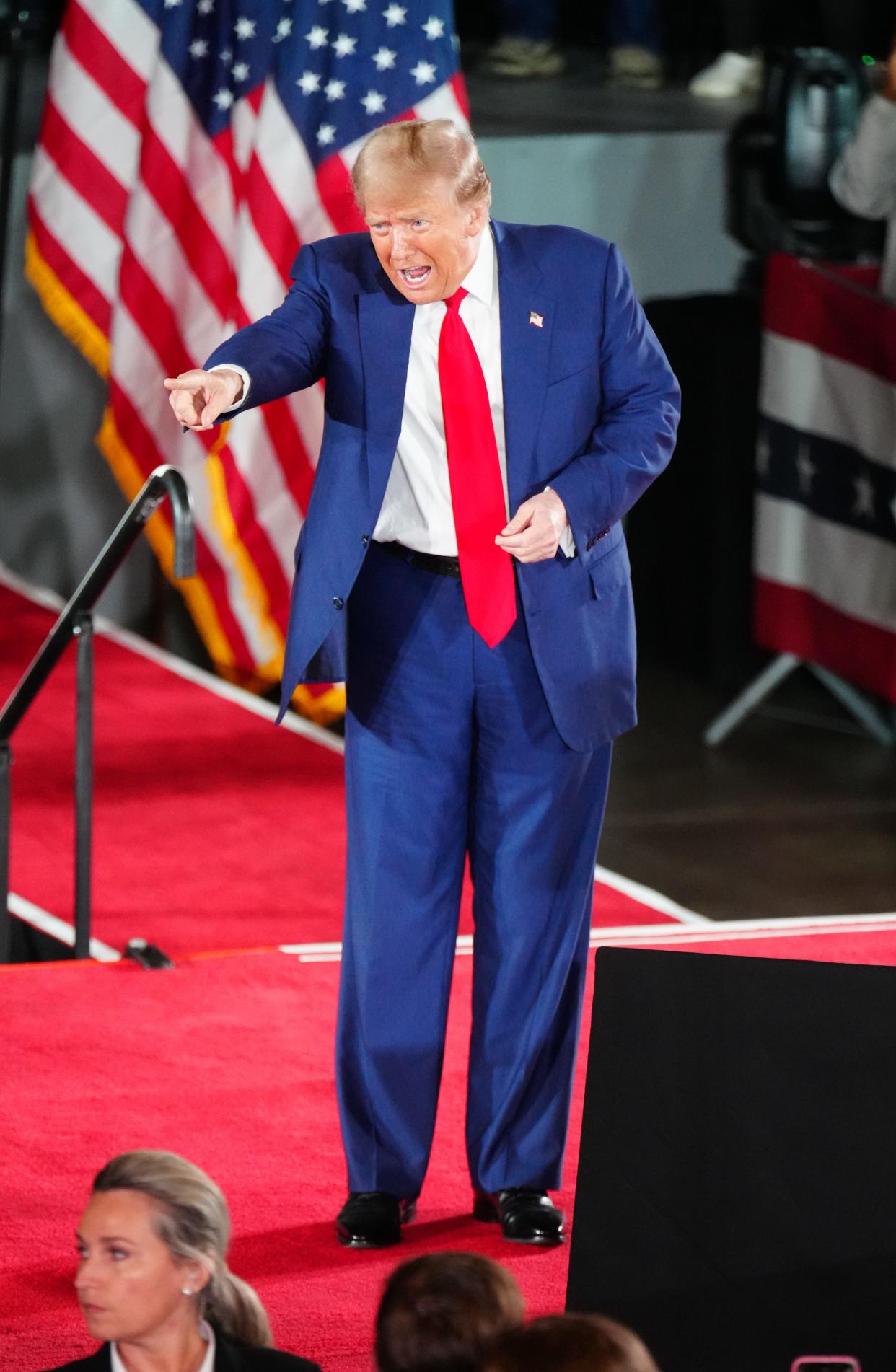Former president Donald Trump acknowledges a supporter during his campaign rally on Wednesday, May 1, 2024 at the Waukesha County Expo Center in Waukesha, Wis.