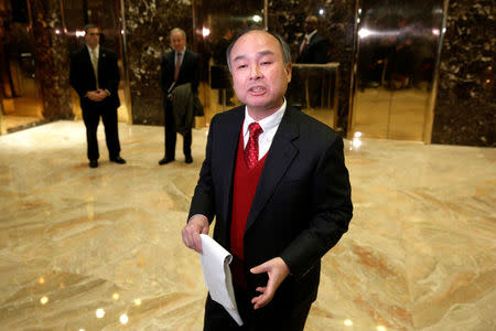 Softbank CEO Masayoshi Son speaks to the press after meeting with U.S. President-elect Donald Trump at Trump Tower in Manhattan, New York City, U.S., December 6, 2016. REUTERS/Brendan McDermid