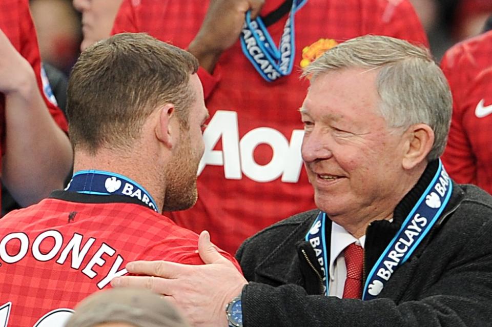 Manchester United manager Sir Alex Ferguson with Wayne Rooney before the trophy presentation