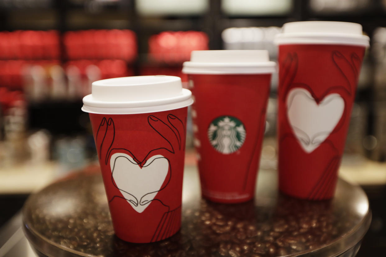 Starbucks cups with a new design at a Starbucks coffee shop in New York on Monday, Nov. 27, 2017. (AP/Hiro Komae)