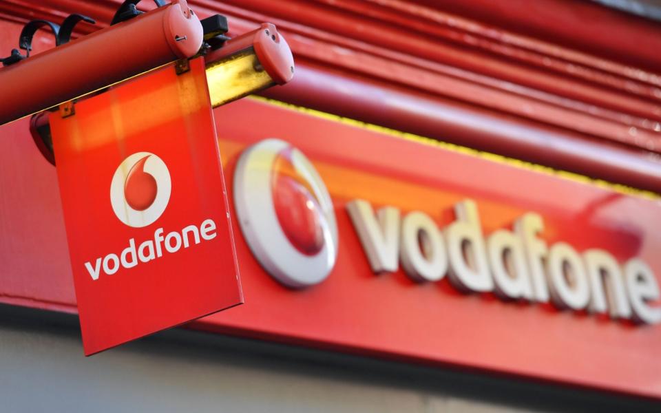 Vodafone Three mobile merger -  BEN STANSALL/AFP