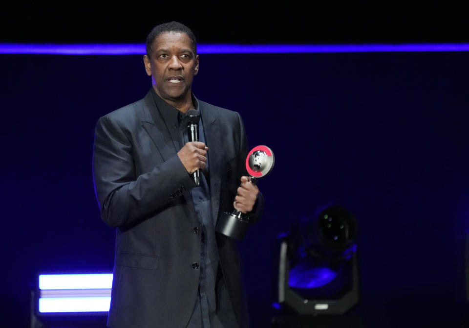 Denzel Washington accepts the CinemaCon Lifetime Achievement Award during the Sony Pictures presentation at CinemaCon 2023, the official convention of the National Association of Theatre Owners (NATO) at Caesars Palace, Monday, April 24, 2023, in Las Vegas. (AP Photo/Chris Pizzello)