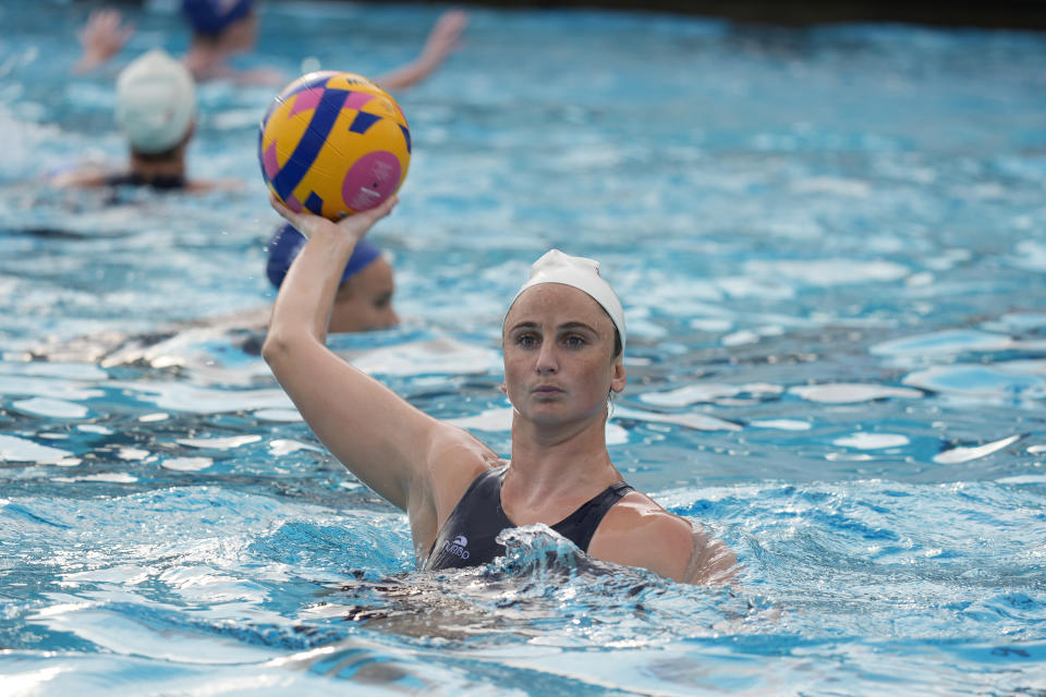 Two-time Olympic gold medalist and attacker Maddie Musselman trains with the U.S. women's water polo team at the Long Beach City College in Long Beach, Calif., on Thursday, Jan. 18, 2024. (AP Photo/Damian Dovarganes)