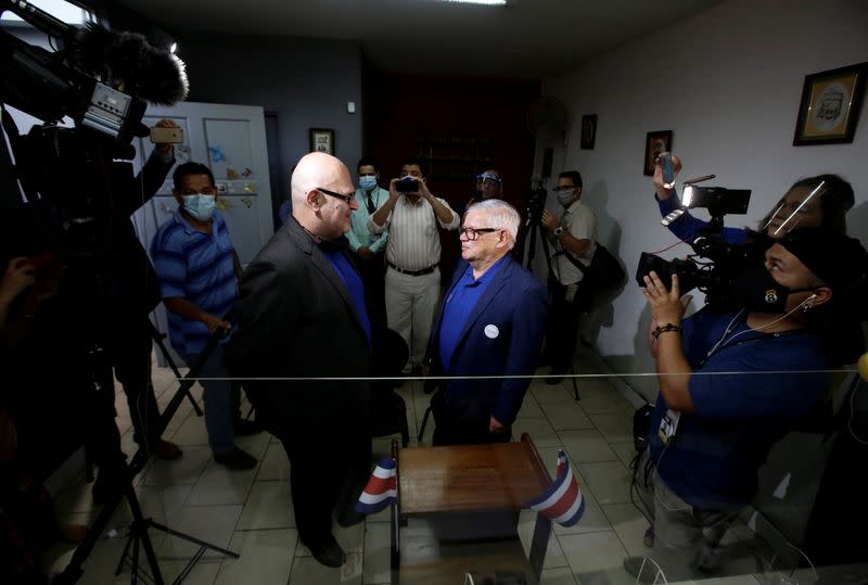 Rodrigo Campos and his partner Marcos Castillo take part in their marriage ceremony, after Costa Rica legalised same-sex marriage, in San Jose