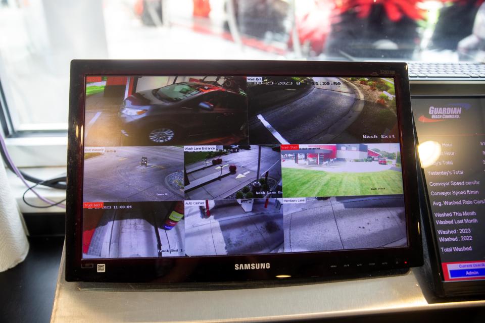 Cameras show cars making their way through the wash cycle at Quality Car Wash in Holland.