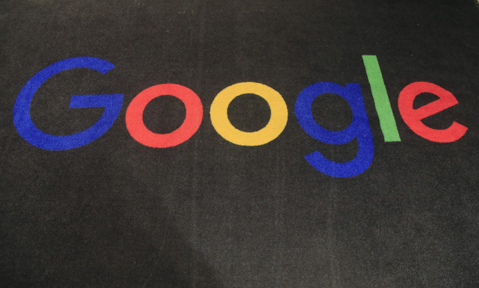 FILE - In this Monday, Nov. 18, 2019 file photo, the logo of Google is displayed on a carpet at the entrance hall of Google France in Paris. Google is heading to a top European Union court Monday Sept, 27, 2021, to appeal a record EU antitrust penalty for stifling competition by abusing the dominance of its Android operating system. (AP Photo/Michel Euler, File)