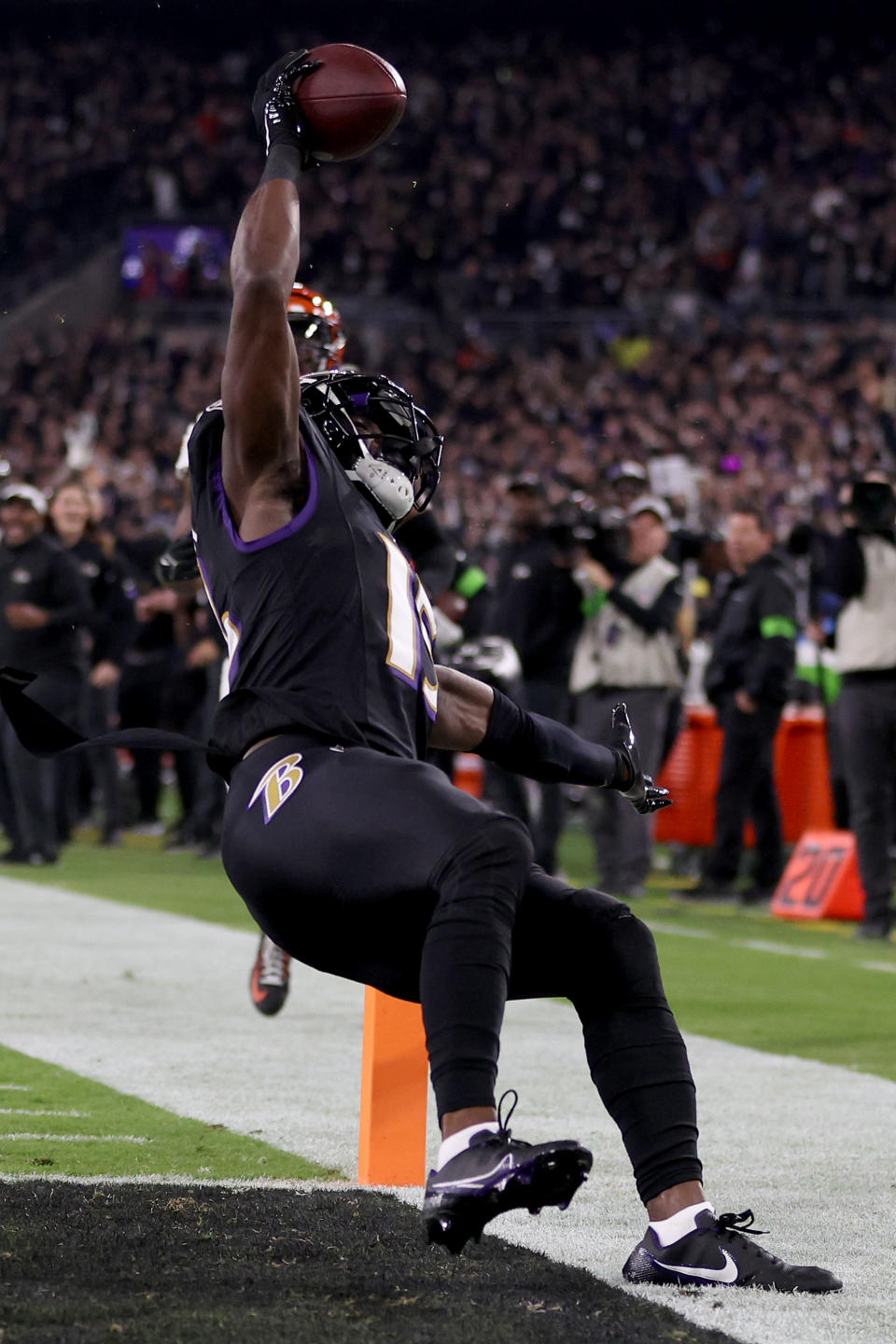 BALTIMORE, MARYLAND – NOVEMBER 16: Nelson Agholor #15 of the Baltimore Ravens does a flip in celebration after scoring a touchdown against the Cincinnati Bengals during the second quarter of the game at M&T Bank Stadium on November 16, 2023 in Baltimore, Maryland. (Photo by Patrick Smith/Getty Images)