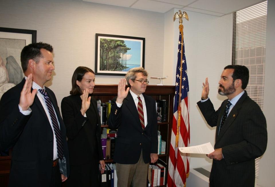 U.S. Attorney Zachary Cunha swears in three new assistant U.S. Attorneys.