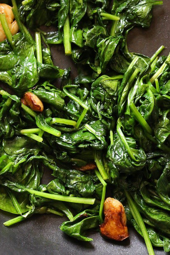 <p>Flavorful and nutritious, this high-fiber green adds lots of flavor without the carbs.</p><p><strong>Get the recipe at <a href="https://www.skinnytaste.com/wilted-baby-spinach-with-garlic-and-oil/" rel="nofollow noopener" target="_blank" data-ylk="slk:SkinnyTaste;elm:context_link;itc:0;sec:content-canvas" class="link ">SkinnyTaste</a>.</strong> </p>