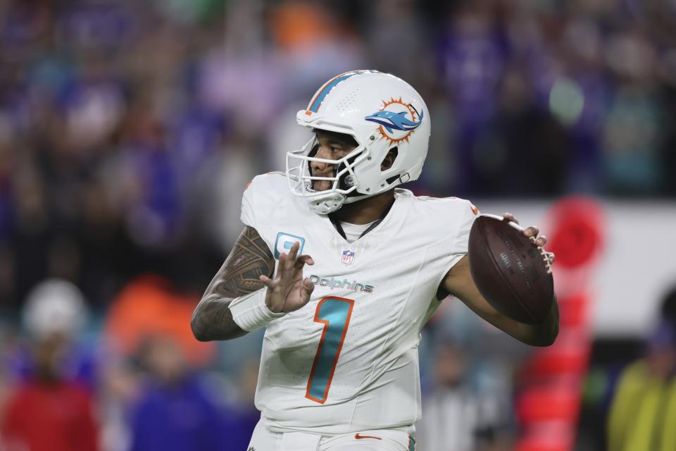 Jan 7, 2024; Miami Gardens, Florida, USA; Miami Dolphins quarterback Tua Tagovailoa (1) throws the football against the Buffalo Bills during the first quarter at Hard Rock Stadium. Mandatory Credit: Sam Navarro-USA TODAY Sports