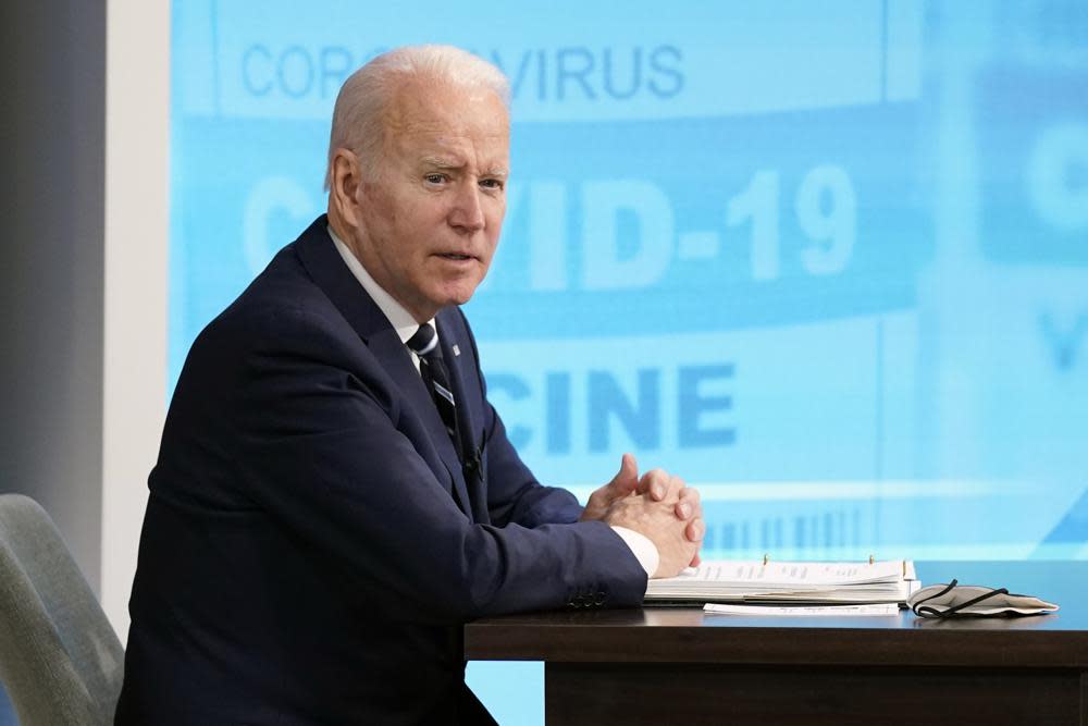 President Joe Biden speaks about the government’s COVID-19 response, in the South Court Auditorium in the Eisenhower Executive Office Building on the White House Campus in Washington, Thursday, Jan. 13, 2022. (AP Photo/Andrew Harnik)