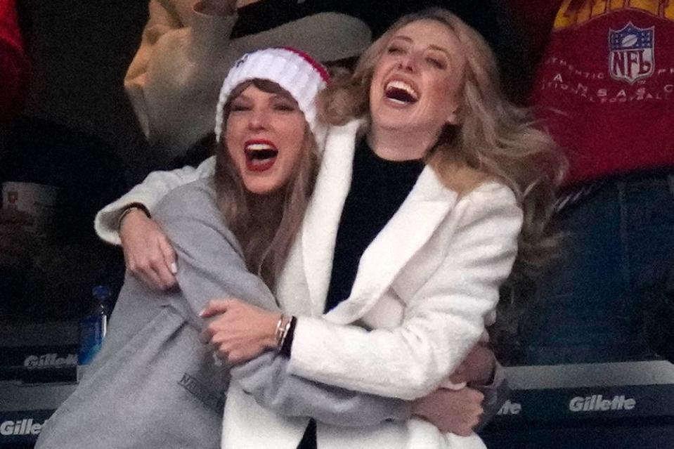 <p>AP Photo/Charles Krupa</p> Taylor Swift and Brittany Mahomes at the Kansas City Chiefs vs. New England Patriots game on Dec. 17