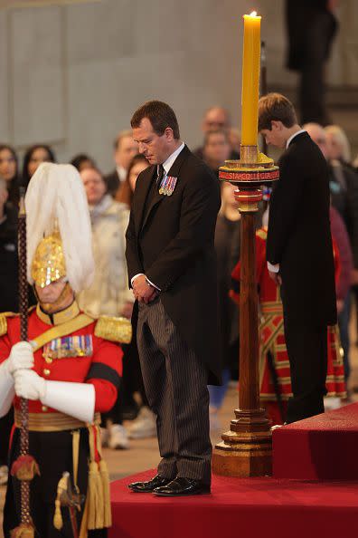 LONDON, ENGLAND - SEPTEMBER 17: Peter Phillips and James, Viscount Severn hold a vigil in honour of Queen Elizabeth II at Westminster Hall on September 17, 2022 in London, England. Queen Elizabeth II's grandchildren mount a family vigil over her coffin lying in state in Westminster Hall. Queen Elizabeth II died at Balmoral Castle in Scotland on September 8, 2022, and is succeeded by her eldest son, King Charles III. (Photo by Chris Jackson/Getty Images)