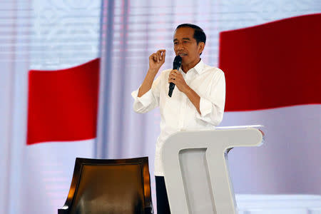 Indonesia's presidential candidate Joko Widodo speaks during a televised debate with his opponent Prabowo Subianto (not pictured) in Jakarta, Indonesia, March 30, 2019. REUTERS/Willy Kurniawan/File Photo