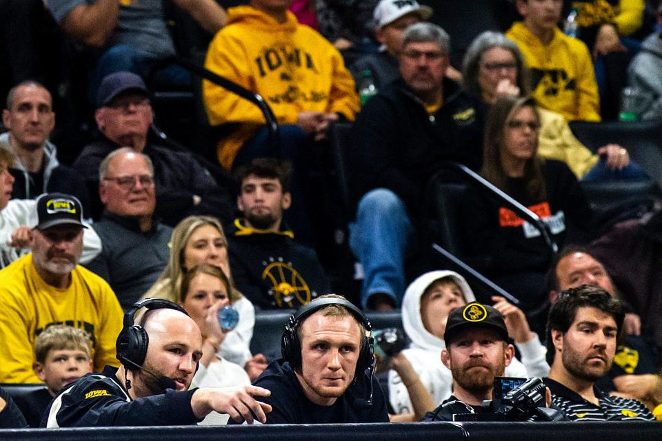 Alex Marinelli, left, and Kaleb Young commentate for BTN+ during a NCAA wrestling dual between Iowa and California Baptist, Sunday, Nov. 13, 2022, at Carver-Hawkeye Arena in Iowa City, Iowa. 