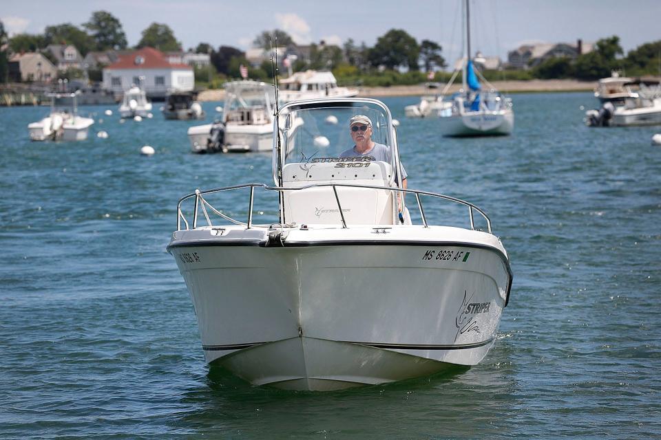 Peter Zona, of Scituate, lands his 21-foot sport fisher at the Jericho Road boat ramp in Scituate.  Boaters are feeling the pinch from high gas prices. Wednesday, June 29, 2022.