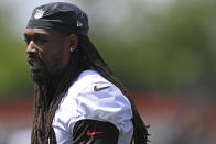 Cleveland Browns defensive linemen Jadeveon Clowney (90) walks during an NFL football practice at the team training facility, Tuesday, June 15, 2021 in Berea, Ohio. (AP Photo/David Dermer)