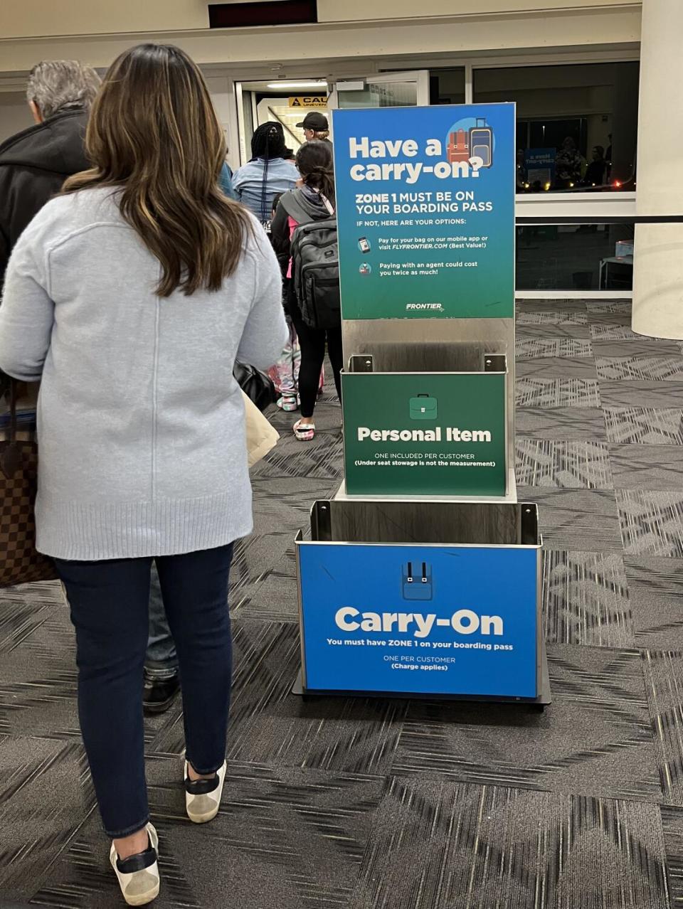 A box to see if your carry-on bag meets the size requirements.