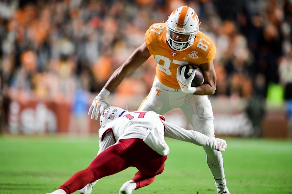 Tennessee tight end Jacob Warren (87) is grabbed by South Alabama cornerback Ryan Melton (17)  in the NCAA football game between the Tennessee Volunteers and South Alabama Jaguars in Knoxville, Tenn. on Saturday, November 20, 2021.