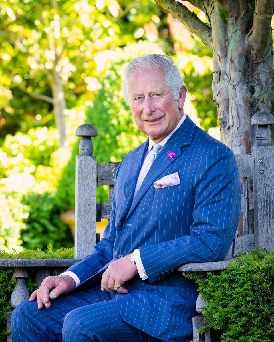 Prince Charles sitting in his garden at Highgrove