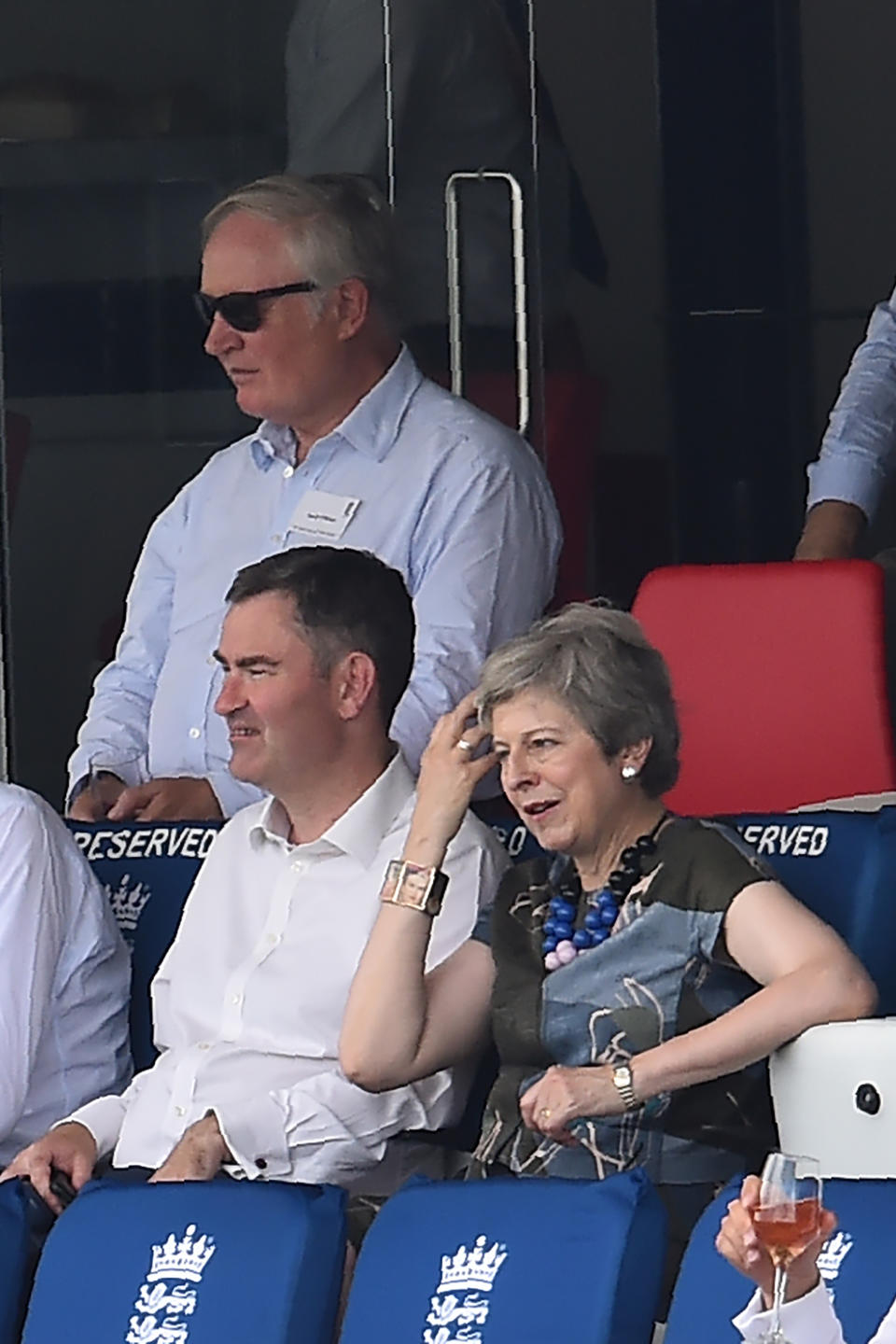 Britain's former Prime Minister Theresa May watches the proceedings with colleague former Justice Secretary and Lord Chancellor David Gauke on the second day of the first cricket test match. [Photo: Getty]