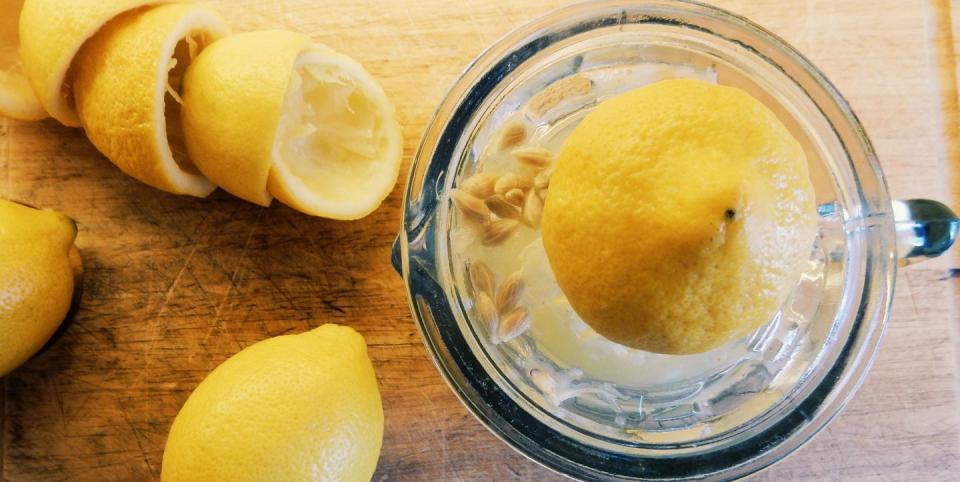 directly above shot of lemon squeezer on table