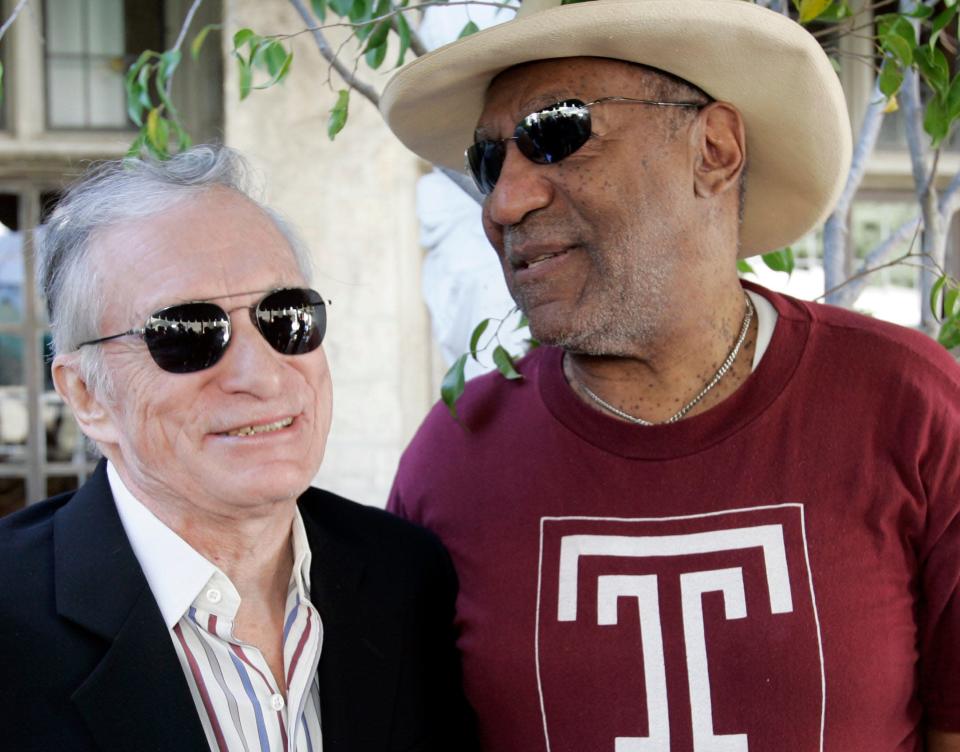Close friends Bill Cosby and Hugh Hefner greet each other at a party to announce the Playboy Jazz Festival lineup at the Playboy Mansion in 2008.