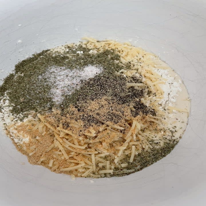 Ingredients for sourdough crackers in a bowl