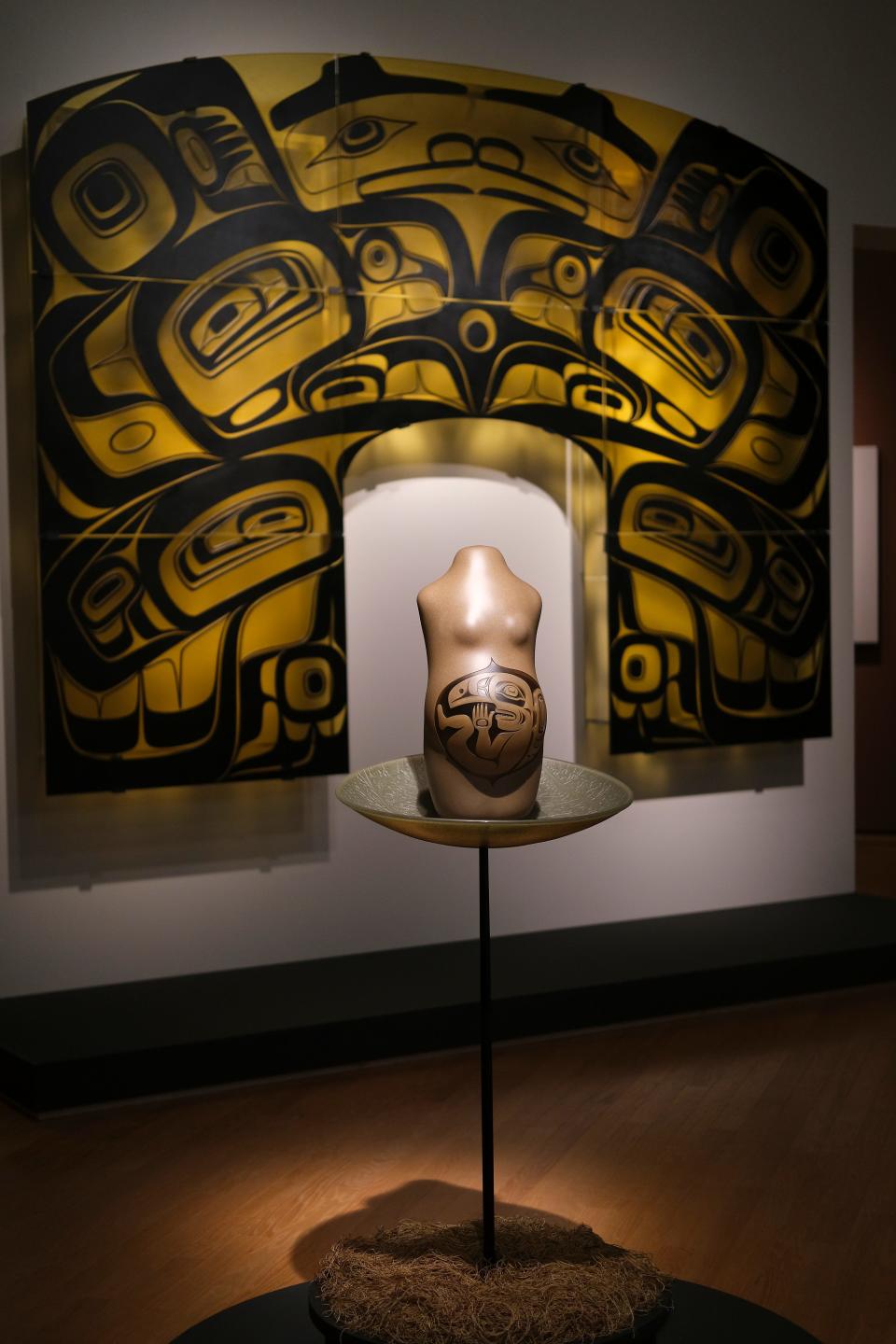 Foreground, K'anashgidel Yak Koowadzitee (Humble Birth) 2018. Oklahoma City Museum of Art exhibit, Preston Singletary: Raven and the Box of Daylight. The multi-sensory experience combines glass, video, and audio to tell the story of Raven, a creator figure in Tlingit culture. Thursday, Nov. 9, 2023