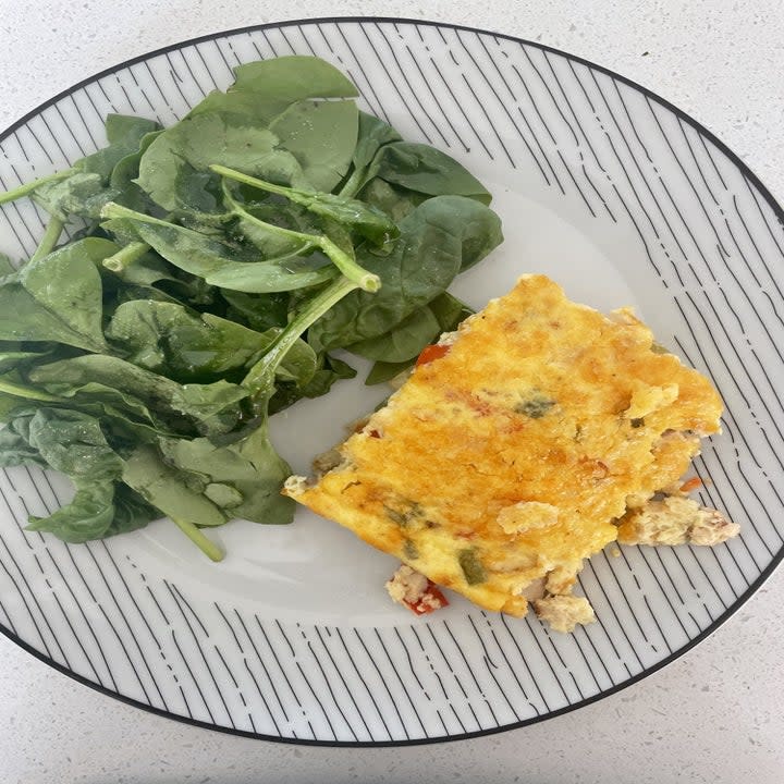 Plated eggs and greens
