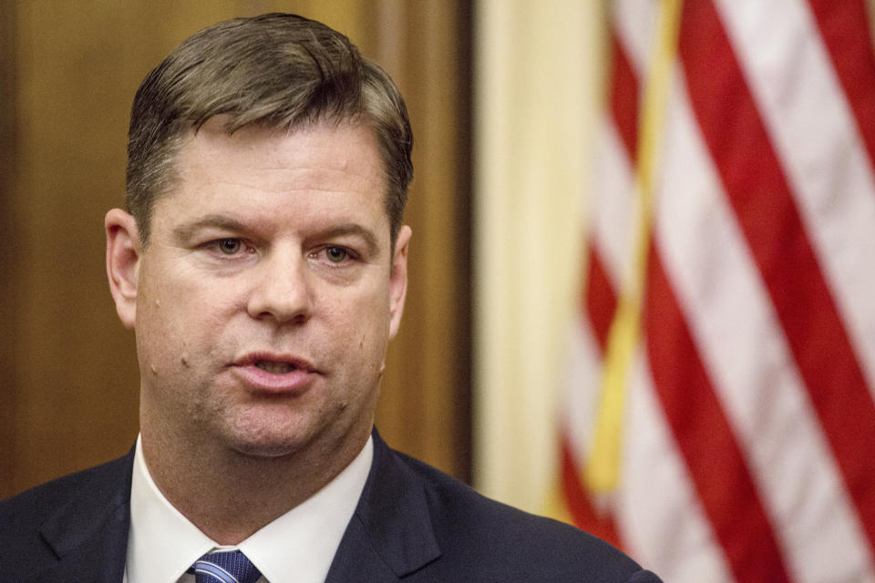 FILE - San Francisco Interim Mayor Mark Farrell speaks to reporters after being sworn into office at City Hall in San Francisco, Tuesday, Jan. 23, 2018. Mayor London Breed has drawn another challenger in the mayoral race in November as former Farrell announced his candidacy Tuesday, Feb. 12, 2024. (AP Photo/Joel Angel Juarez, File)