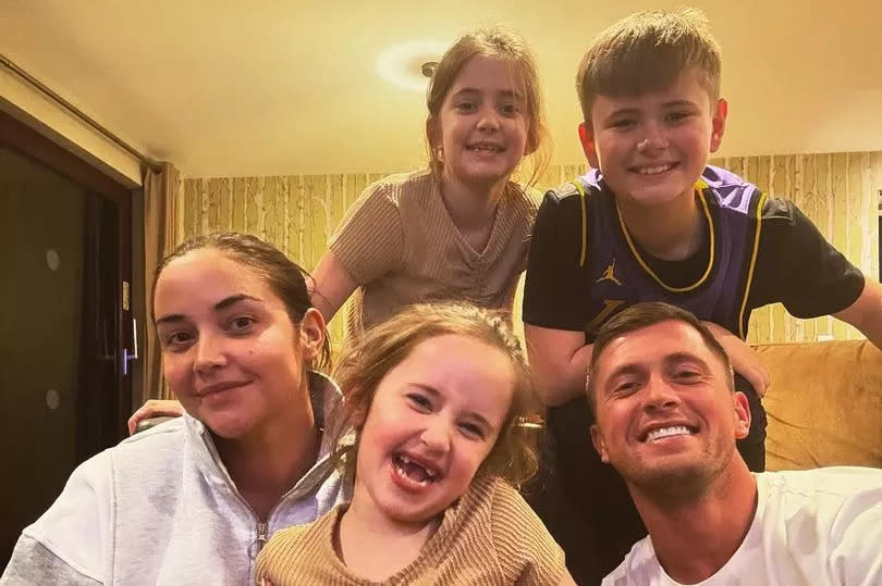 Dan Osborne with his wife and kids