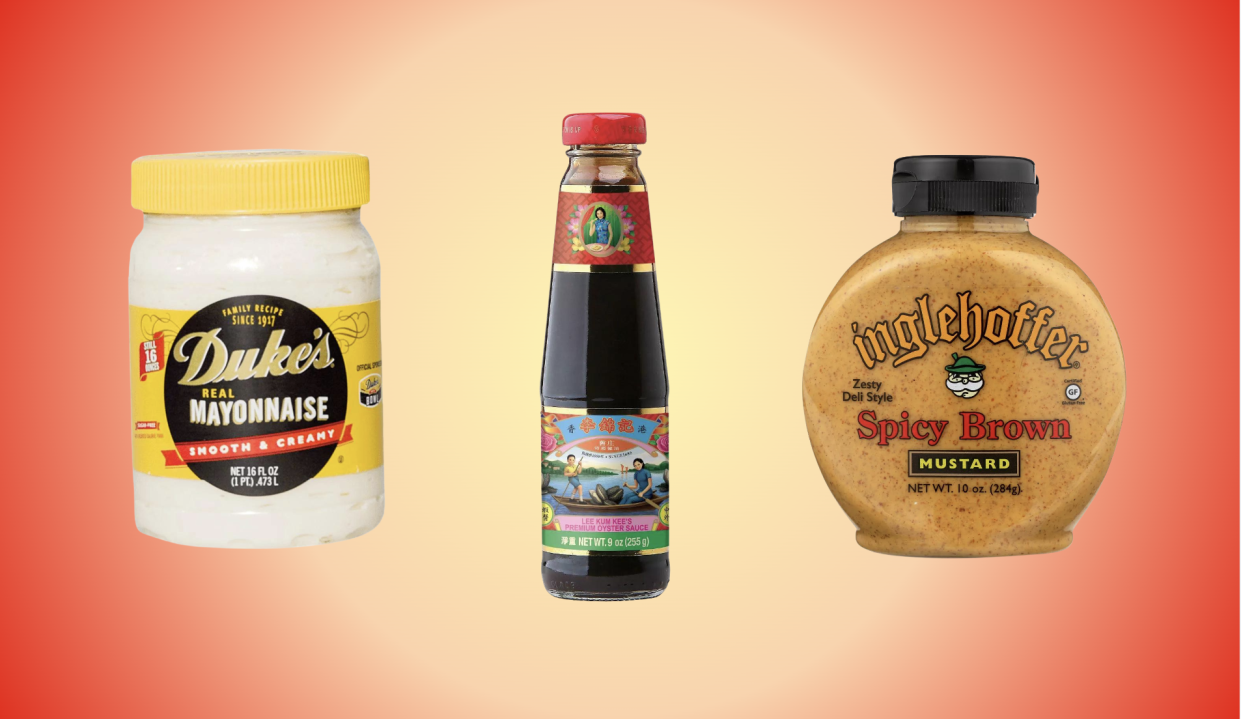 A jar of mayonnaise, a bottle of oyster sauce and a jar of mustard on a red-and-yellow background