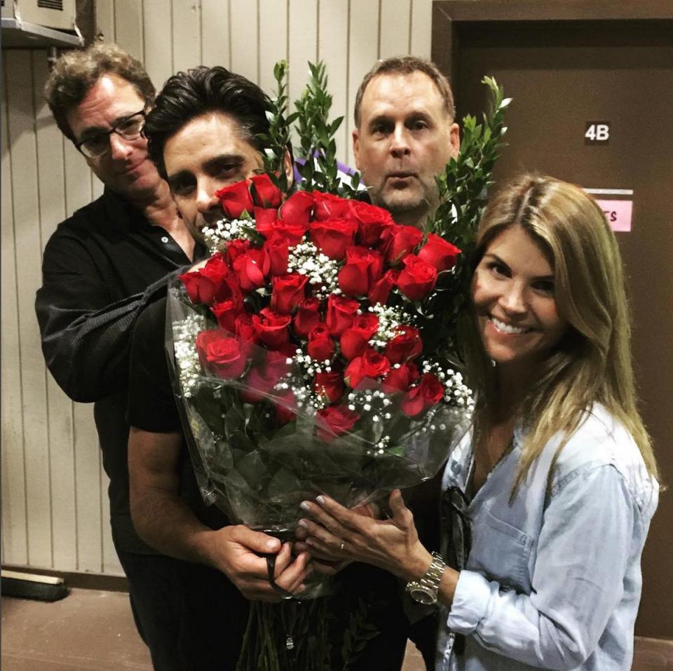 <p>Stamos and his "Fuller House" cast mates <a href="http://www.huffingtonpost.com/entry/lori-loughlin-51st-birthday-fuller-house_55b8d6efe4b0224d88348892?kvcommref=mostpopular">surprised Loughlin with a huge bouquet of roses for her 51st birthday</a>&nbsp;while they were filming the reboot series. Our hearts melted.&nbsp;</p>